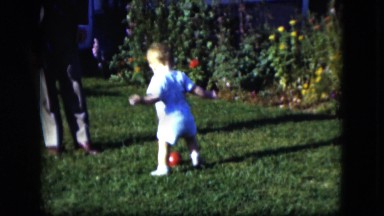 1951: The Tiny Toddler Tries His Best to Kick the Ball Hard in Cleveland, Ohio