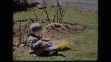 1951: beautiful little boy entertained with his toys in a field day CLEVELAND
