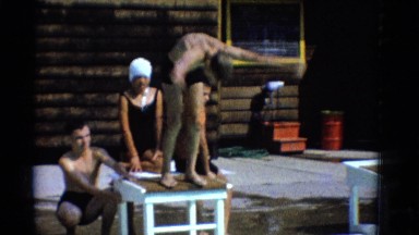 1953: boy dives into pool NEW YORK