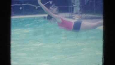 1953: cute women jumping into the swimming pool and having a nice day NEW YORK