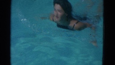 1953: a woman is swimming in the pool NEW YORK
