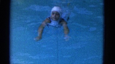 1953: a woman swims in the pool. NEW YORK