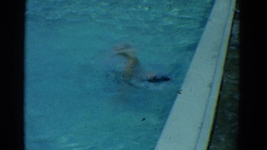 1953: kid swimming pool freestyle move fast water waves NEW YORK