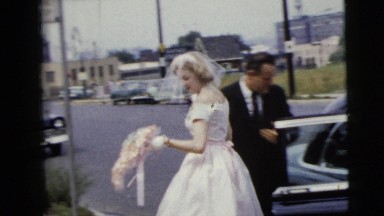 1962: Beautiful Bridesmaids Exiting Car on Boston Street