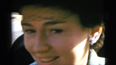 1962: A Beautiful Lady Wearing Amazing Earring and Hat Talking in Boston