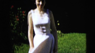 1962: gorgeous dress woman garden walks down close up BOSTON