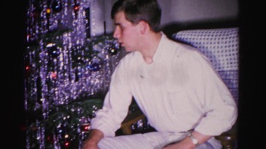 1967: a dutiful son or brother distributing gifts to the family on christmas