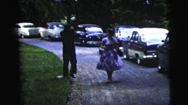 1962: couple walk together suit man dress pretty purple INDIANA