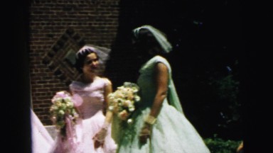 1964: bride and bridesmaid maid of honor wedding dress pink bouquet flowers