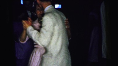 1964: older woman and younger man on a formal dance floor CAMDEN, NEW JERSEY