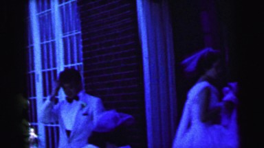 1964: brides and grooms entering a building CAMDEN, NEW JERSEY