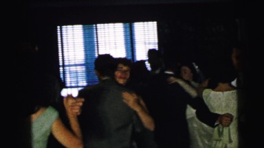 1964: ladies and gentlemen are dressed elegantly and are dancing