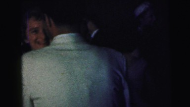 1964: several couples dancing during a lively party in an enclosed space CAMDEN