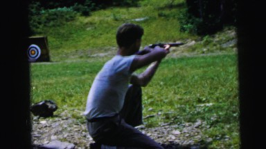 1964: a young boy practices targeting skills in secrecy with purpose CAMDEN