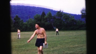 1964: fit older gentleman walking off of a baseball field