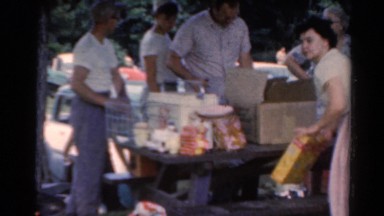 1964: people outdoor having a large family picnic with the kids CALIFORNIA