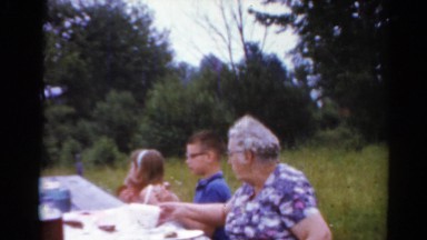 1964: a family having food during the picnic in the open air CALIFORNIA
