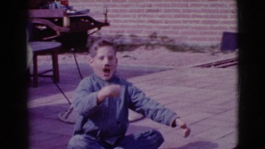 1968: excited boy displaying all the easter eggs he's found CLARKSDALE, ARIZONA