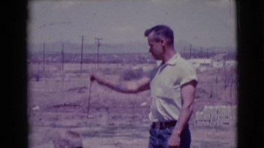 1968: father and two sons playing outdoor in the countryside CLARKSDALE, ARIZONA