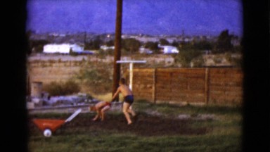 1968: two young boys outdoor on the lawn playing in the dirt and mud CLARKSDALE