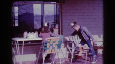 1968: children play outdoor during a birthday party. CLARKSDALE, ARIZONA