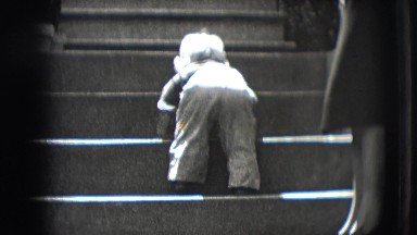 1942: Toddler Girl Climbs Stairs in New York