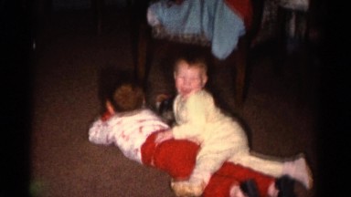 1962: two little boys playing with each other. CATSKILL, NEW YORK