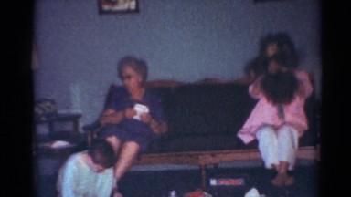 1964: a family is sitting down to eat dinner together