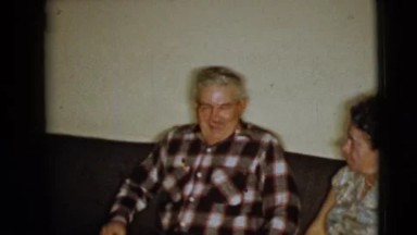 1968: conversation between two older people on a couch CLARKSDALE, ARIZONA