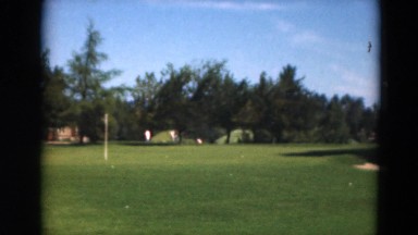 1949: a sweeping view of one of the greens on a golf course MINNESOTA