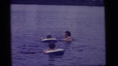 1965: water tube training children father CAMDEN, NEW JERSEY