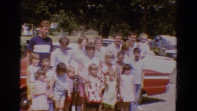1968: a large group of people congregated to pose on a very sunny day DILLER