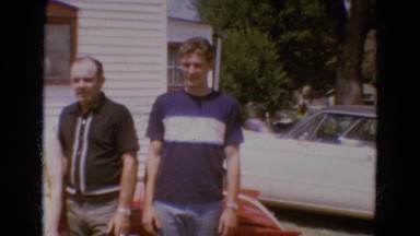 1968: two groups of people posing alternately at the camera