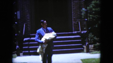 1951: A Father Walking With His Newborn Child Cleveland, Ohio