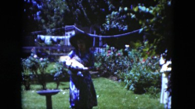 1951: Woman Holding Baby Outdoor in Park Cleveland, Ohio
