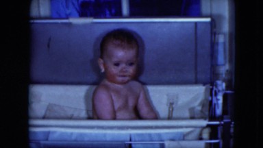 1951: Toddler Crawling and Resting on Grass in Cleveland, Ohio