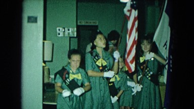 1966: Young Girls Holding Ceremonial Flags in California