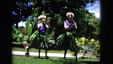 1966: girls in grass skirts performing a group hula dance CALIFORNIA
