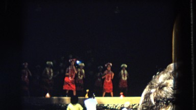 1966: people watching child dancers on a stage in a park HAWAII