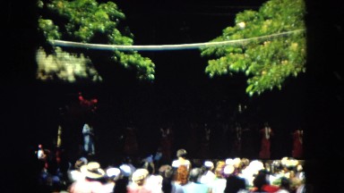 1966: people watching dancers on a stage in a park HAWAII