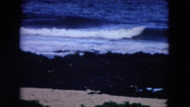 1966: the waves crash against the shoreline of california HAWAII