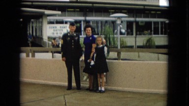 1967: family is greeting a soldier back home DISNEYLAND, CALIFORNIA
