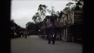 1967: tourists viewing old buildings DISNEYLAND, CALIFORNIA