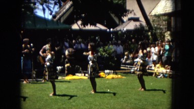 1967: several women outdoors performing a hula dance DISNEYLAND, CALIFORNIA
