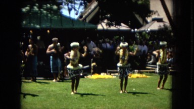 1967: women doing a hula dance in a tropical setting DISNEYLAND, CALIFORNIA