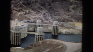 1967: a large mountain dam set stretching across canyon walls ARIZONA