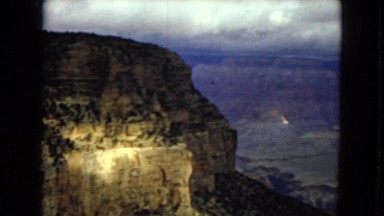 1967: the cliff of a rocky mountain with weak vegetation ARIZONA