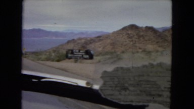 1967: a beautiful mountain ridge as seen through the window of a moving vehicle