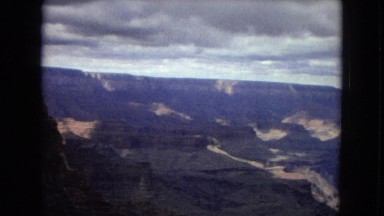 1967: a view of canyons and mountains on a cloudy day ARIZONA
