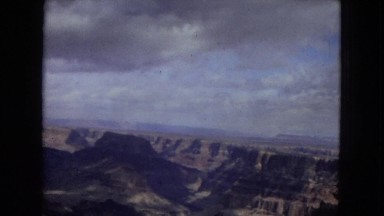 1967: view of a rocky canyon showing a mountain plateau in the distant horizon